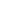 Smiling woman wearing clear dental aligners, demonstrating orthodontic treatment results in professional setting.