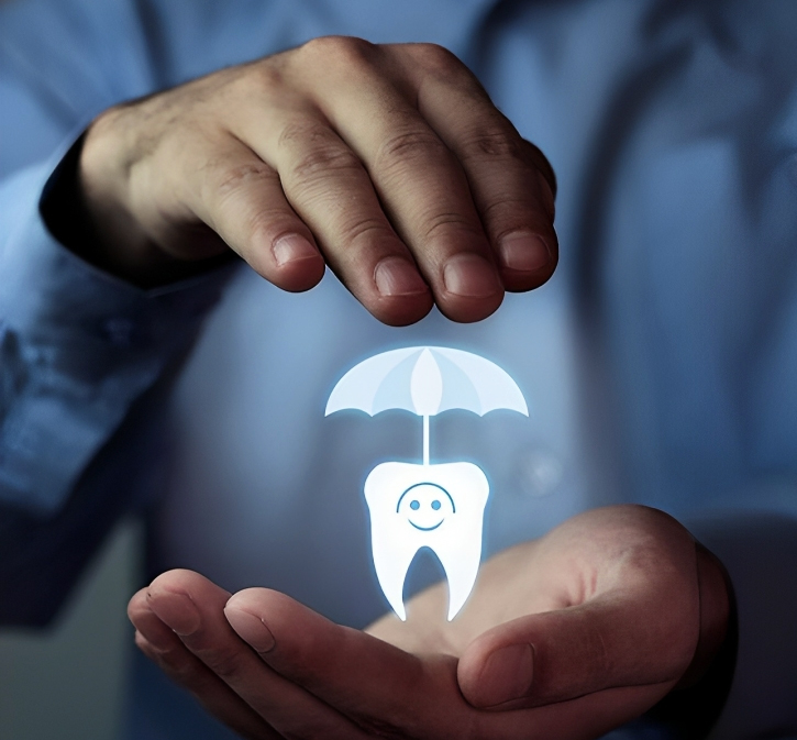 Hands protecting glowing tooth and umbrella icon, symbolizing dental care and protection services.